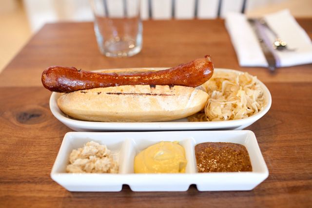 The Farmerâs Brat ($8), served with a bread roll, sauerkraut, horseradish, German mustard and plum ketchup.